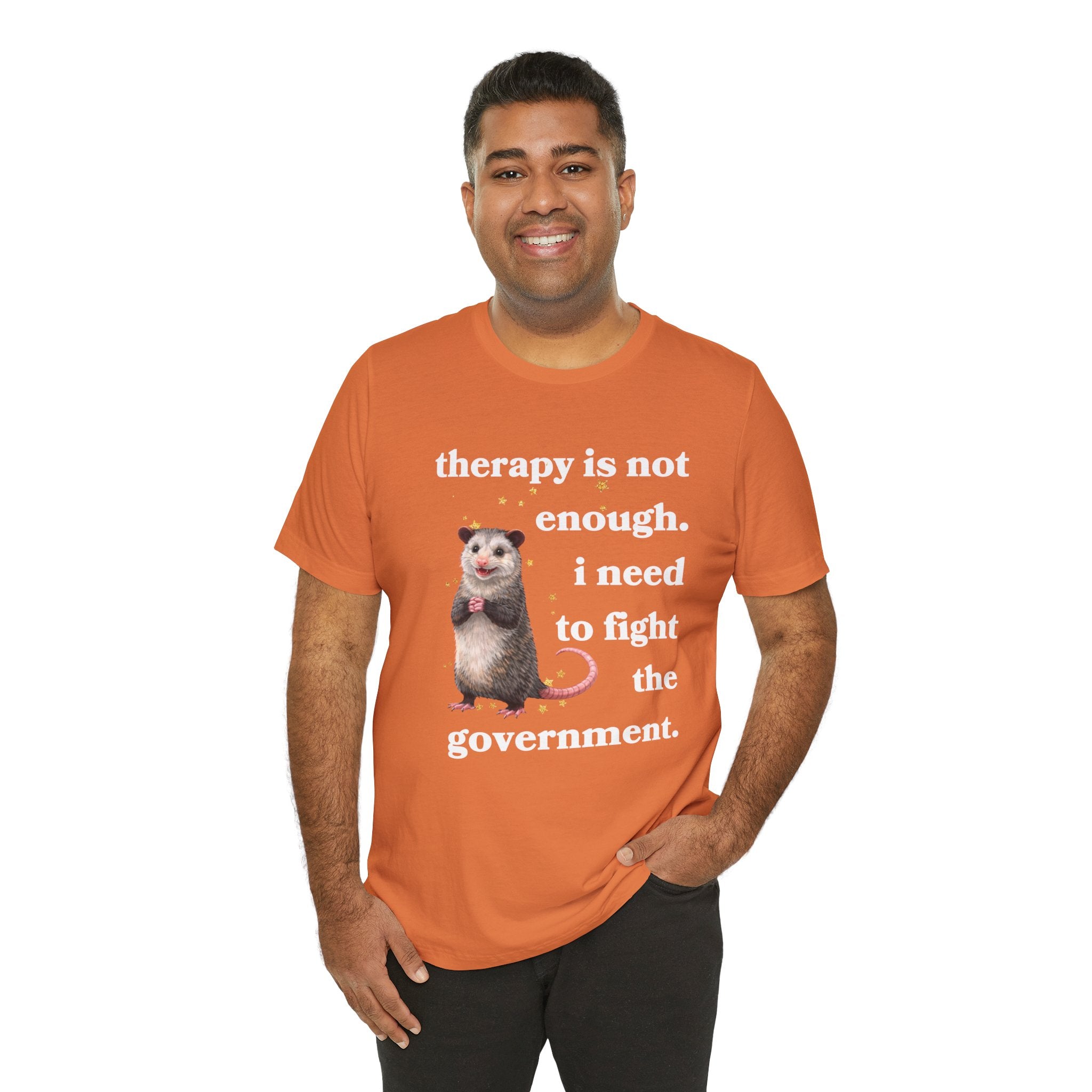 therapy is not enough. i need to fight the government Bella + Canvas T-shirt