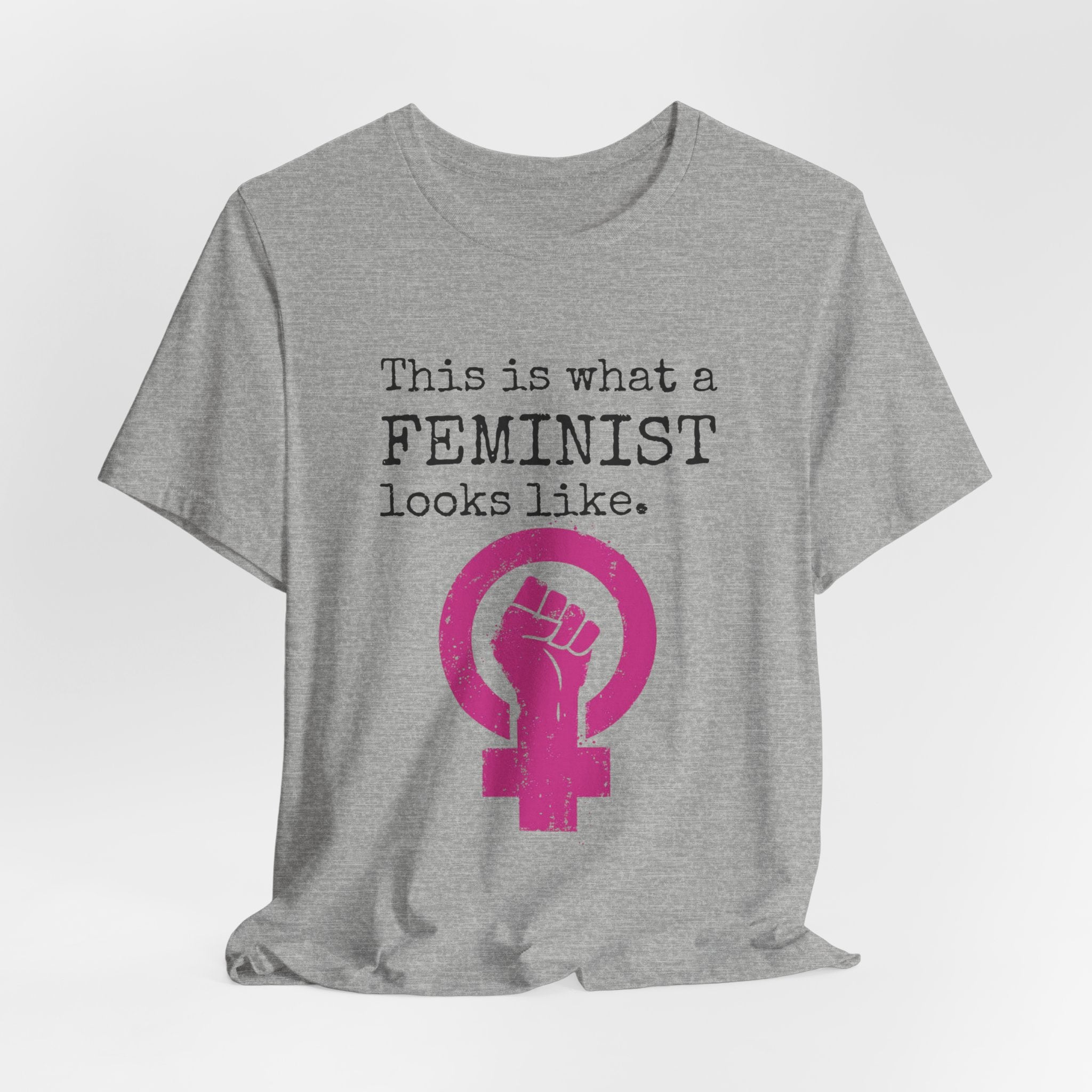 Feminist T‑Shirt — “This Is What a FEMINIST Looks Like” Pink Symbol Tee